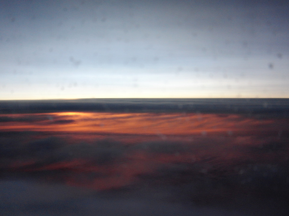 CIMG0636_sun_rising_below_clouds